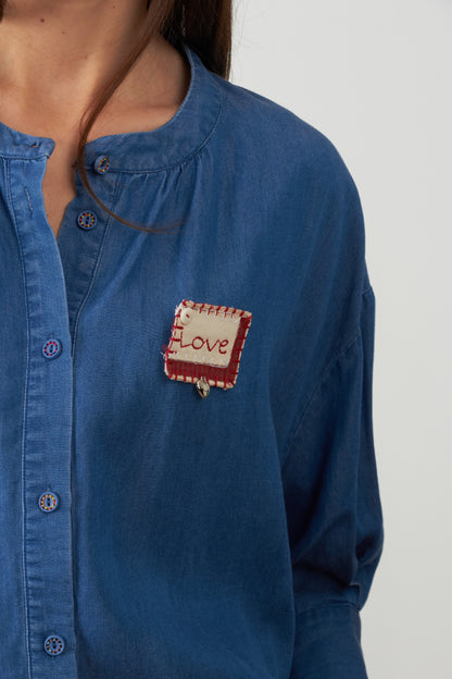 Blouse avec badge Love Simone - Bleu Chambray